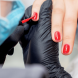 manicurist-paints-nails 2-min